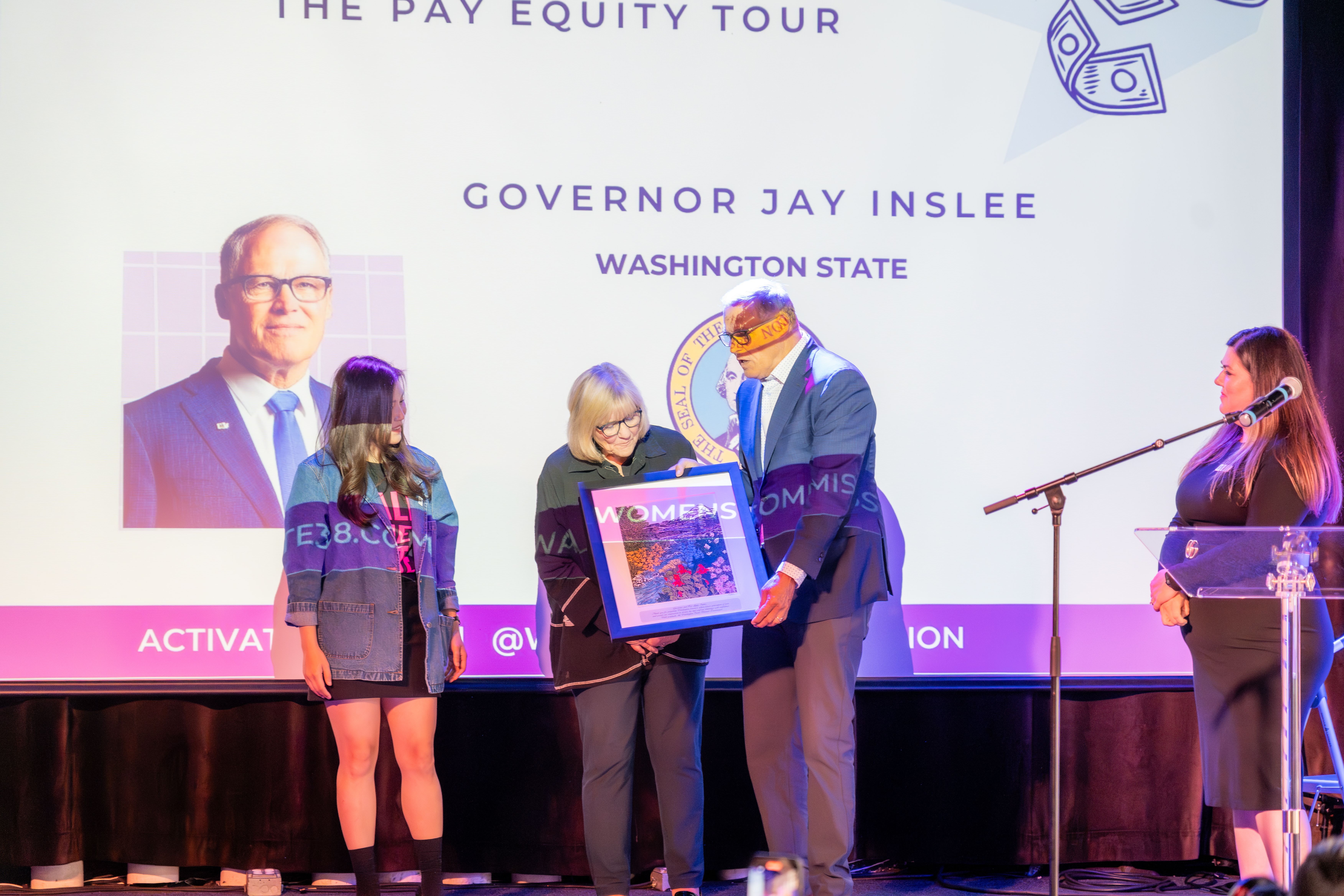 WSWC gift Governor and First Lady Inslee with a portrait of Mt. Rainier as a thank you for their years of service on behalf of WA Women.